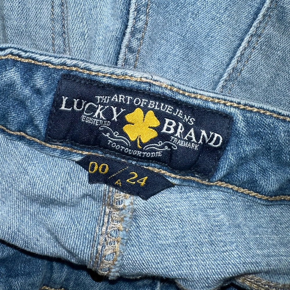 Distressed blue jeans - Picture 4 of 4